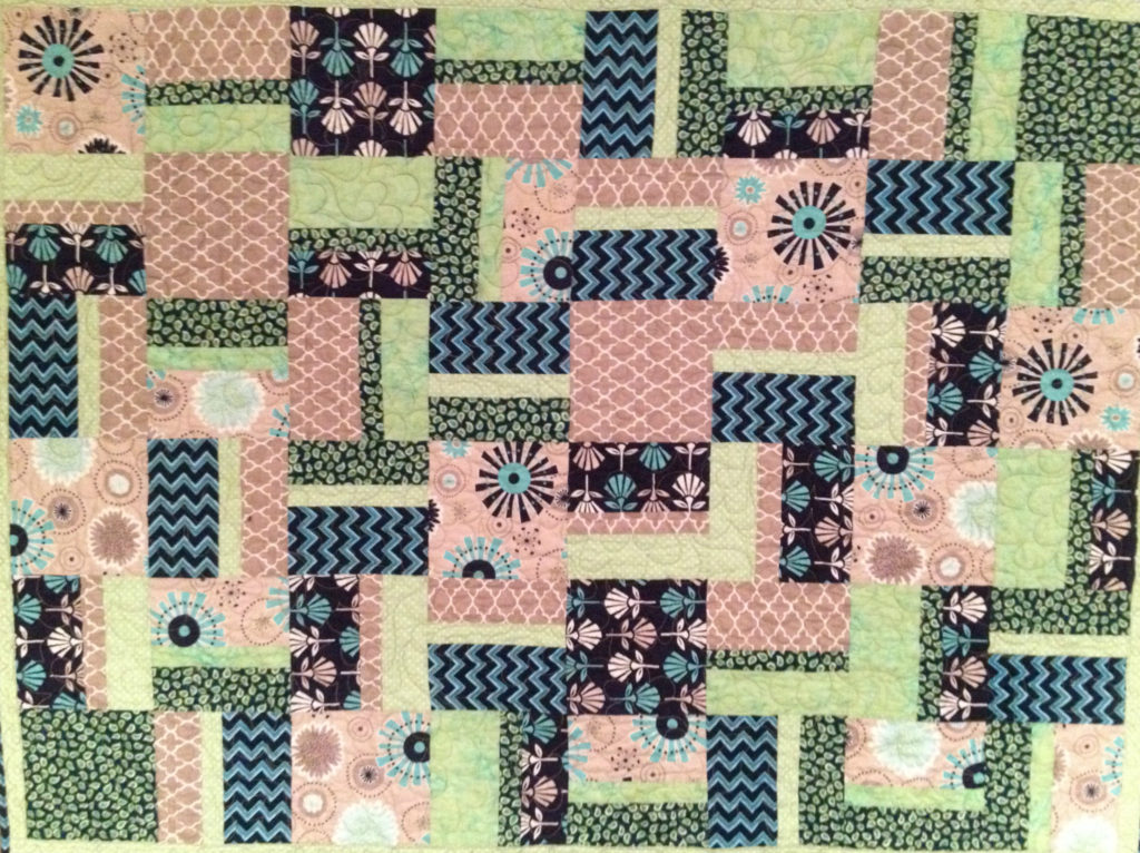 mint, gray, and navy blue nursery quilt